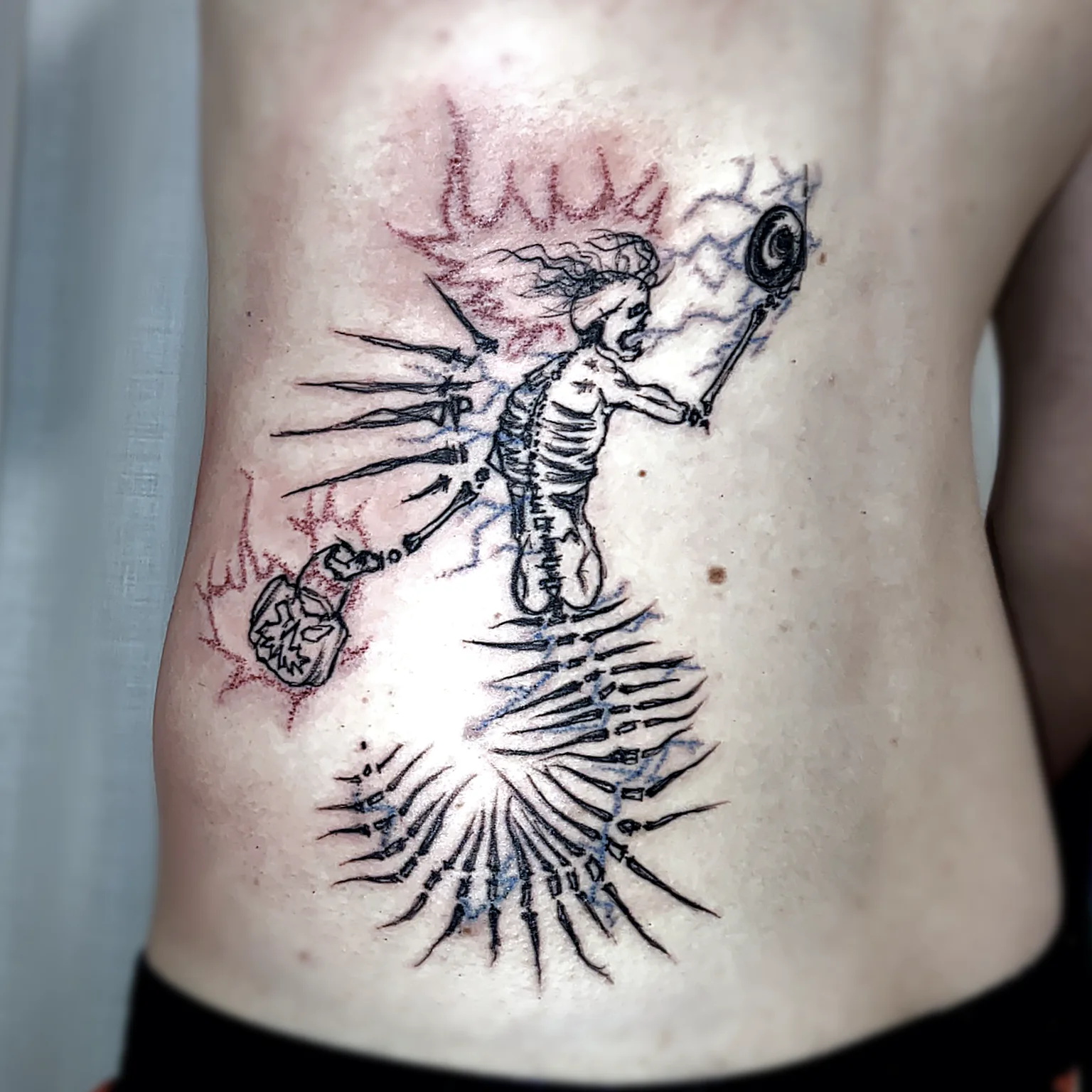 Skeleton-Siren of Fire and Lightning with Halloween Twist